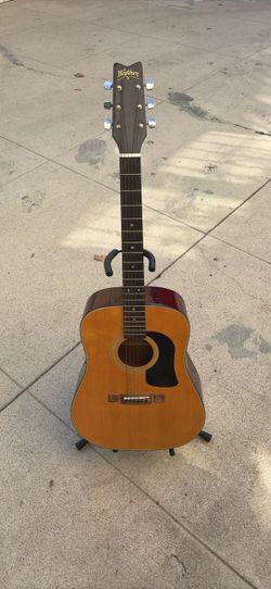 Vintage George Washburn D10N full-size acoustic guitar from 1993.