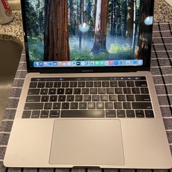 2018 MacBook Pro Touchbar 13-inch 2.3GHz quad core Intel i5  8gb Ram  500gb ssd   Only 65 battery cycles but shows service recommended for battery   