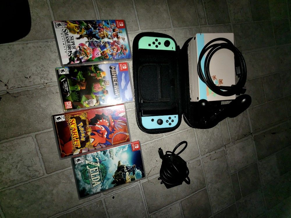 “Nintendo Switch Animal Crossing Edition + 4 Games (TOTK, Smash, Pokémon, Minecraft) – Great Condition!”