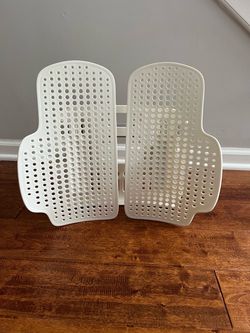 Breathable backrest resembles a lumbar support cushion