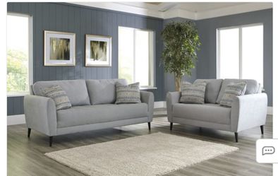 Cardello Sofa, Loveseat, And Ottoman Set