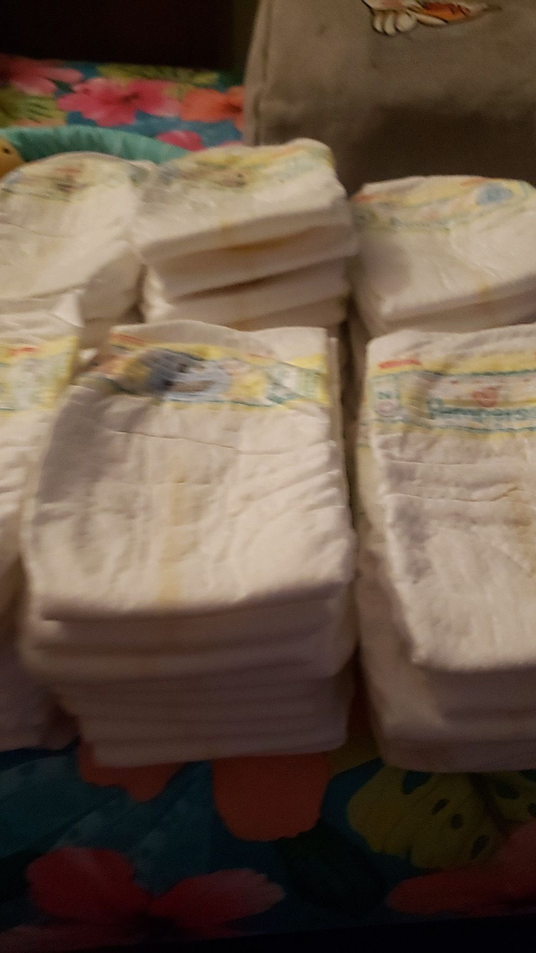 57 Pampers Newborn diapers plus 13 extra Walmart diapers
