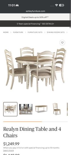 Ashley Realyn Dining Table and 4 Chairs