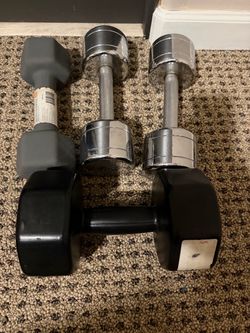 2 sets of dumbbells- 50 pounds total