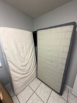 Twin mattress, box spring, and metal frame