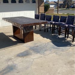 8 People Dining Table Can Turned To A 6 People Nothing Broke Just The Chairs The Leather Is Peellin Chairs Come Whit Cover 