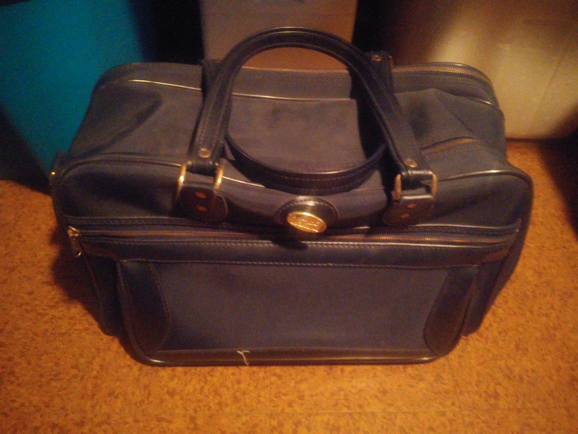 Duffel Bag & Hardcase Suitcase