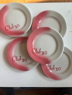 Five art deco, ceramic side plates