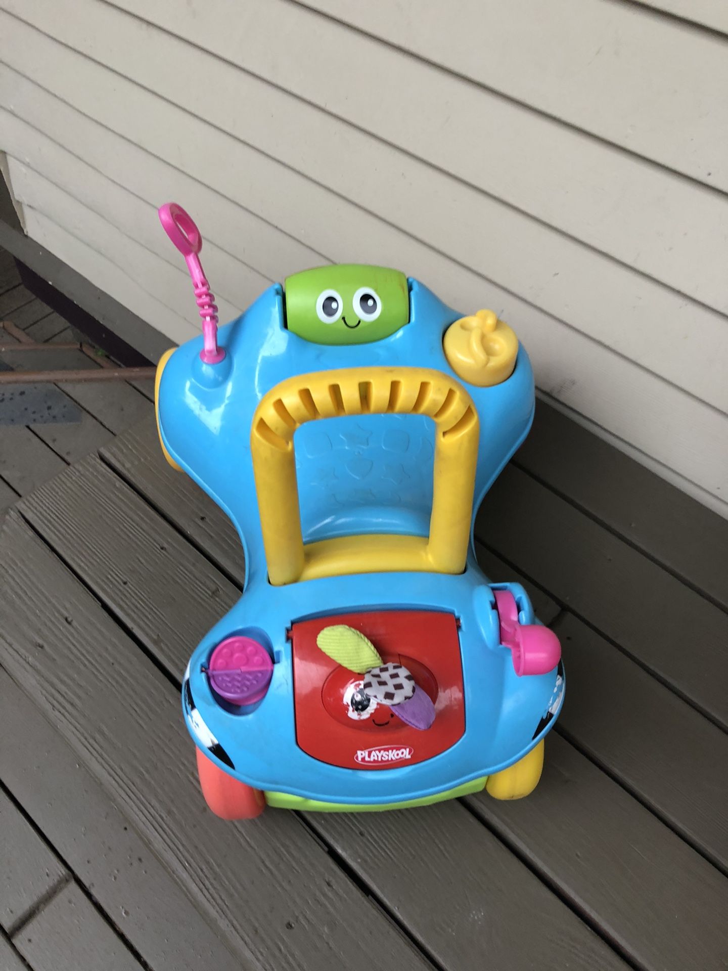Convertible walker and rider for toddler. Folds into a walker.