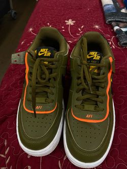 Nike Olive Green Sneakers – Black & Orange Accents