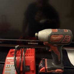Milwaukee M18 Drill Battery And Charger 