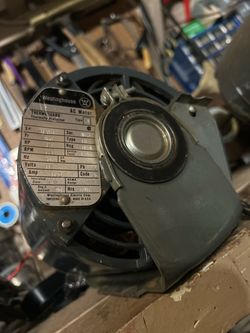 ELECTRIC MOTOR HEAVY DUTY WESTINGHOUSE 11 AMP 120 VOLT WITH BRACKET AND PULLY