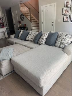 Large sectional couch with ottoman