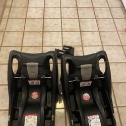 Baby Two Bases Of Carseat Britax And A Pair Clips