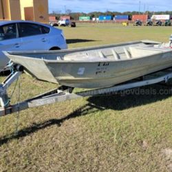 14' War Eagle  ,trailer and 15hp Evinrude