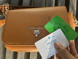 Prada logo-plaque leather shoulder bag