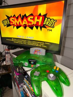 Jungle Green Nintendo 64 with expansion pack includes two jungle green