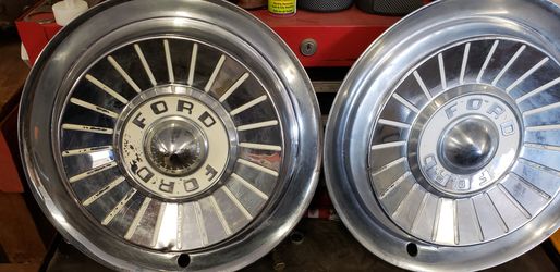 60's? 14" Ford wheel covers.