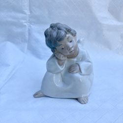 Lladro No. 4539 Angel Pensando (retired 2005) perfect condition… Still in original box $50.