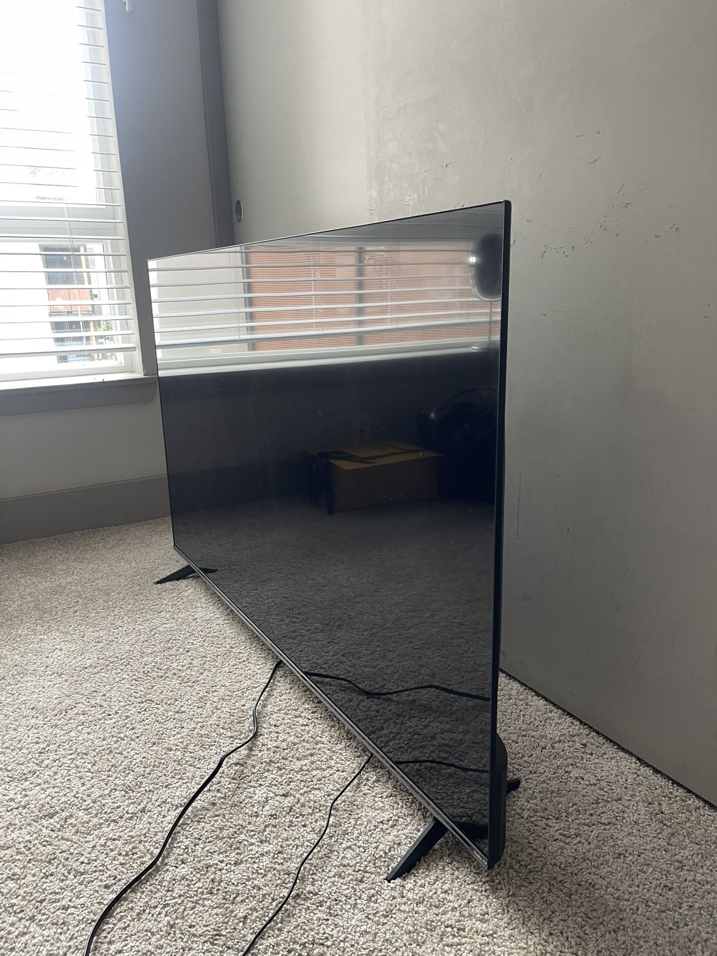 TCL 55” - 4K UHD HDR Smart TV with Roku TV