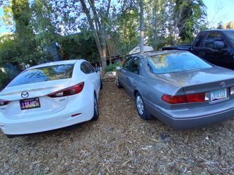 Mazda3 Sedan 127.000 miles resrored title