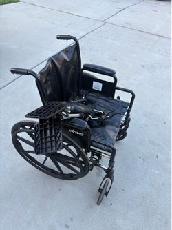 Wheel chair and leg rests