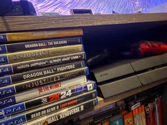 PS4 with games and 2 remotes