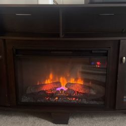 60”  Wood Fire Place Tv Stand (Great Condition) PICK UP ONLY 