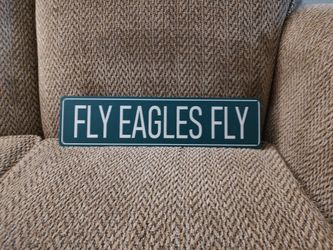 "FLY EAGLES FLY"  METAL SIGN.  16" X 4".  NEW.  PICKUP ONLY.