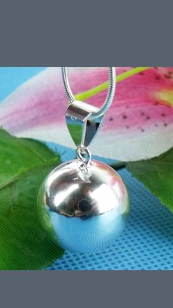 Sterling silver ball necklace that chimes
