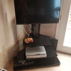 Television With TV Stand And Accessory Stand