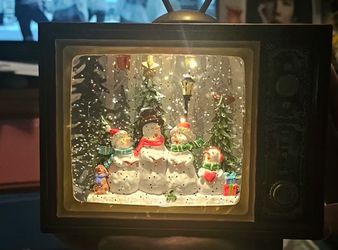 Christmas snow globe TV