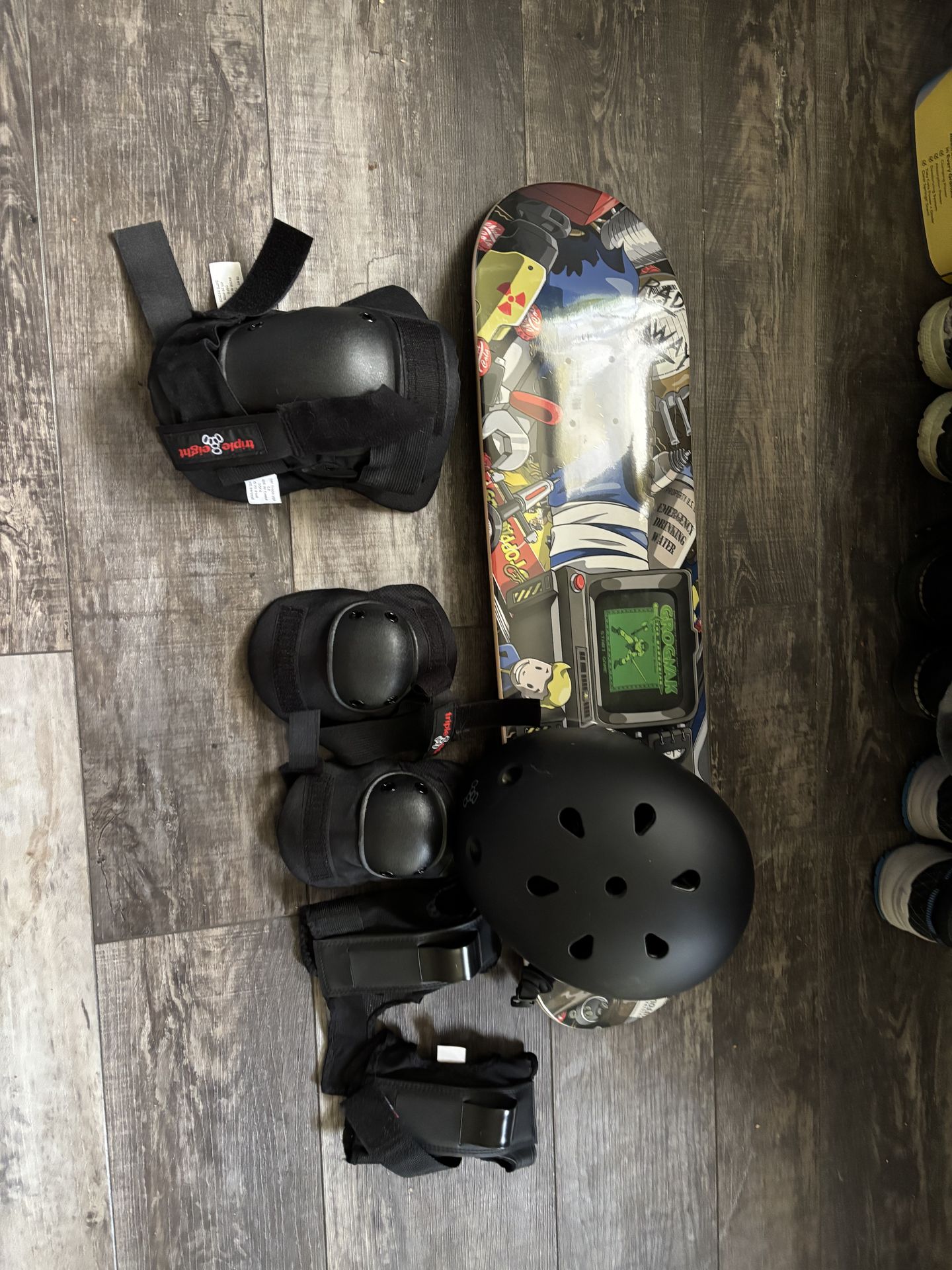 Skate board, helmet, pads.