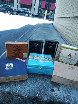 assorted wooden cigar boxes