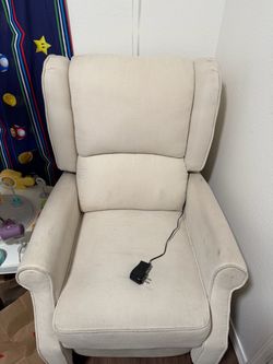 Sofá reclinable y masajeador
