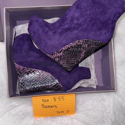 Bakers women’s purple wedge boots 