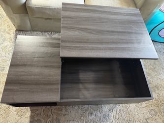 Coffee Table with Sliding Top Storage