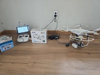 Old dji 2 drone with a go pro 3 /w remote and brand new f28 drone