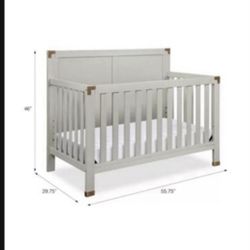 BRAND NEW CRIB WITH MATRESS
