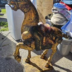 19th century wooden gilt tang style horse. Measurements are 41 inches tall 36 in wide 14 inches deep. 