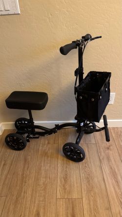 Knee scooter with basket