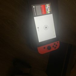 Nintendo Switch With Everything In Picture And Mario Cart 8 Game