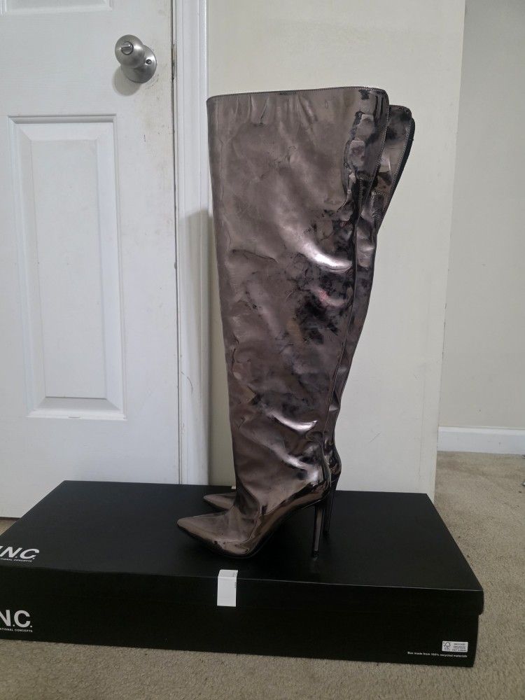 Tall dress boots, worn once, in good condition, size 9.5.