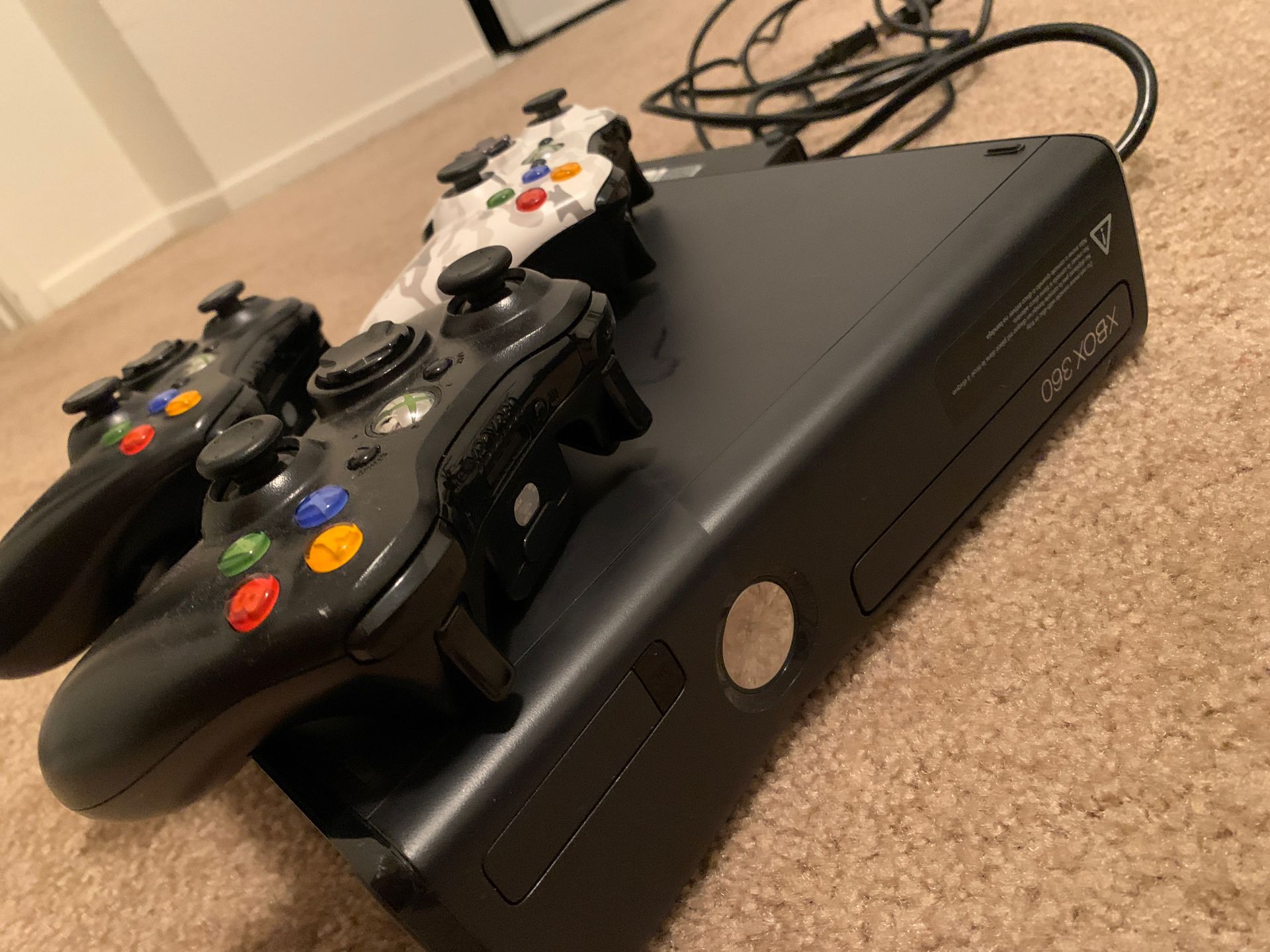 Xbox 360 with 3 controllers and games