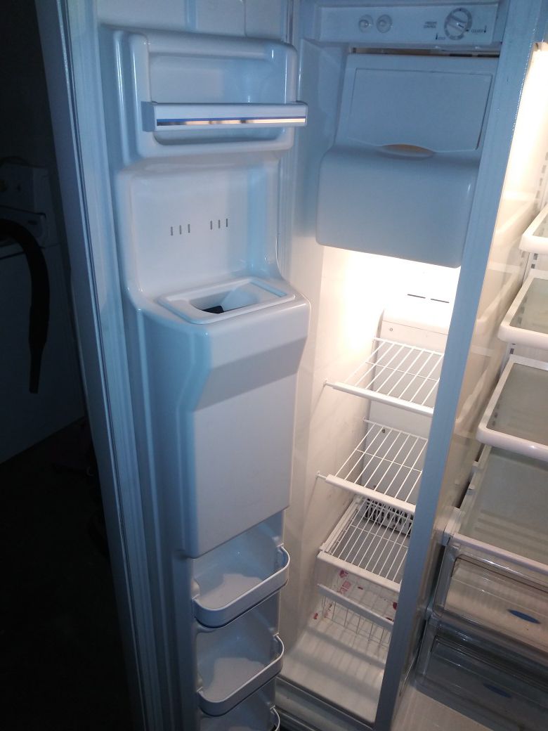 Frigidaire refrigerator side by side for sale works great