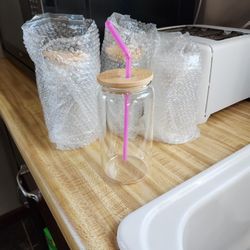 Four Glass Cups With Lids