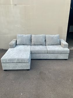 Living Spaces Gray Sectional Sofa