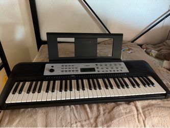 Yamaha Electric Keyboard with Music Stand
