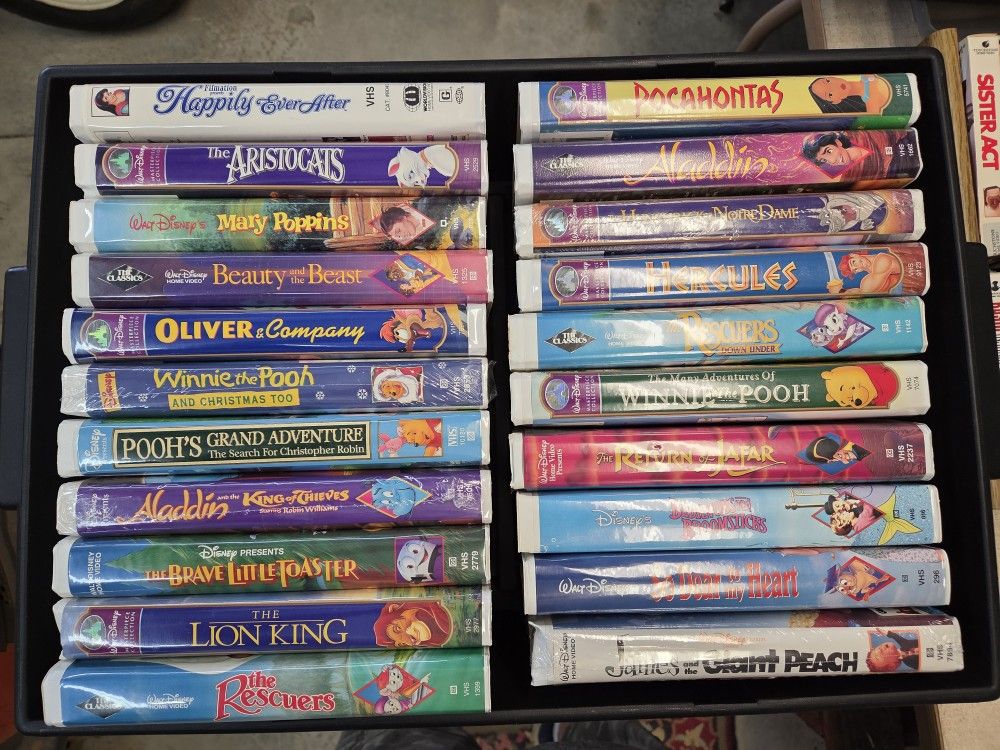 Collection of Disney movies some have never been opened Vhs.