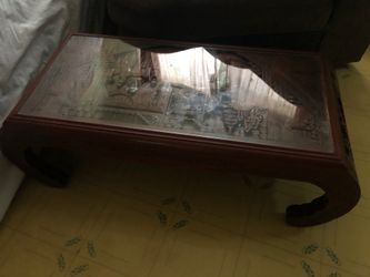 Hand carve solid elmwood cocktail coffee table.